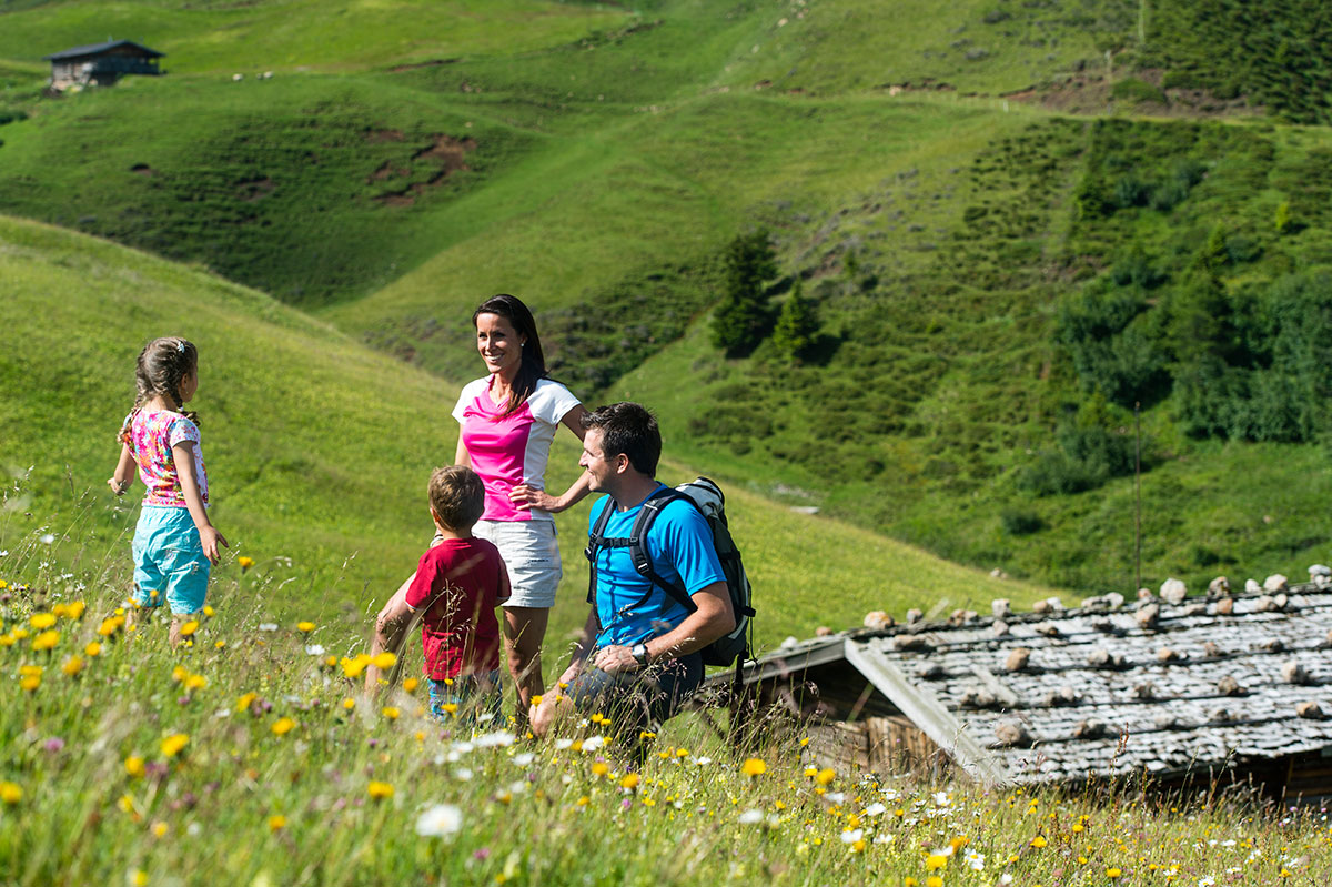 Hiking with children on the beatiful Alpe di Siusi in the Dolomites