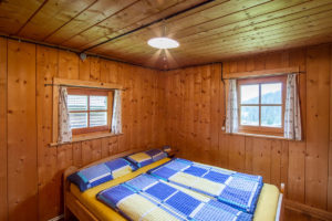 Bedroom in our apartment larch in the Dolomites